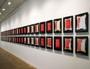 Wide-angled view of 27 beaded Indian Act pages